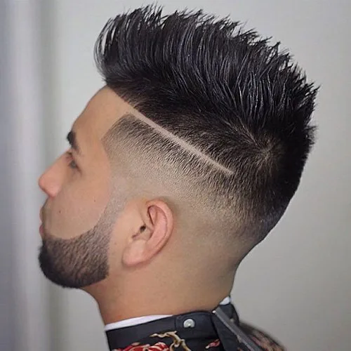 Burst fade mohawk with tapered beard