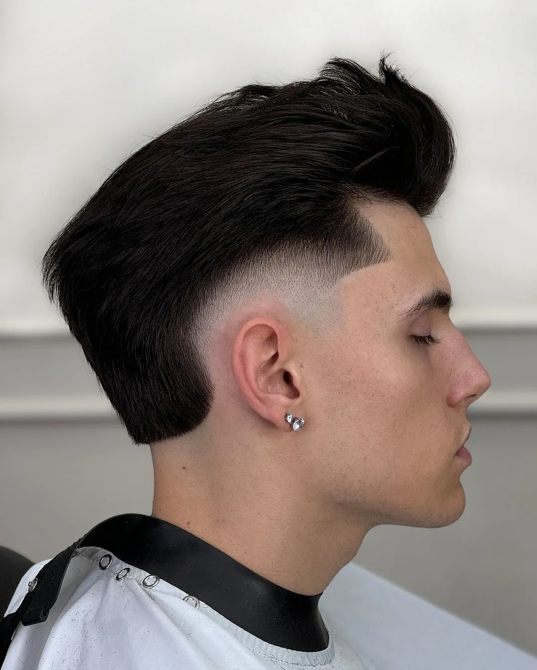 Slick Back Pomp with Burst Fade Slick Back Pomp with Burst Fade