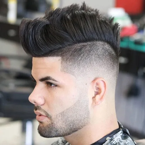 Long top faded haircut with beard