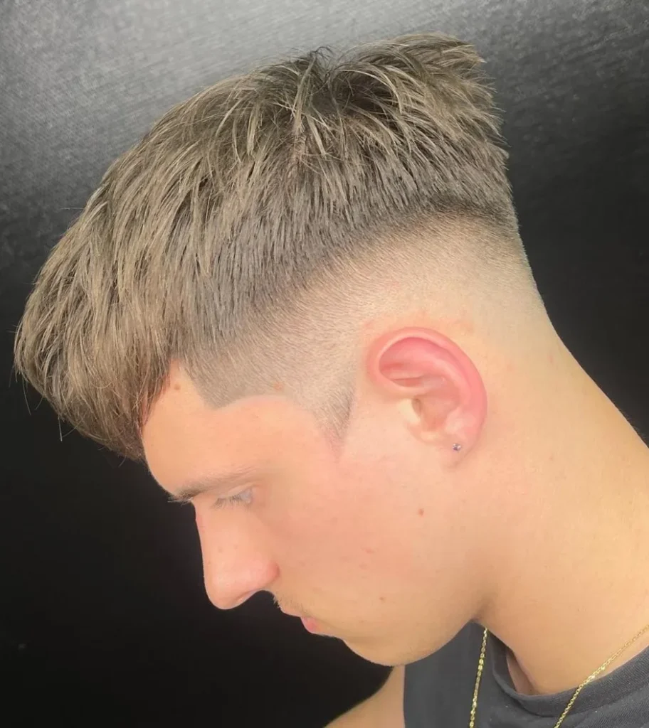 Side-Swept Fringe with Low Taper Fade