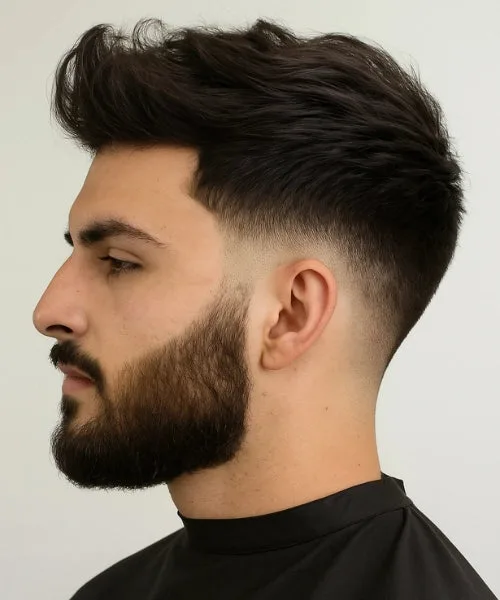 Faux Hawk haircut with soft layers and tapered sides for a natural, structured finish.