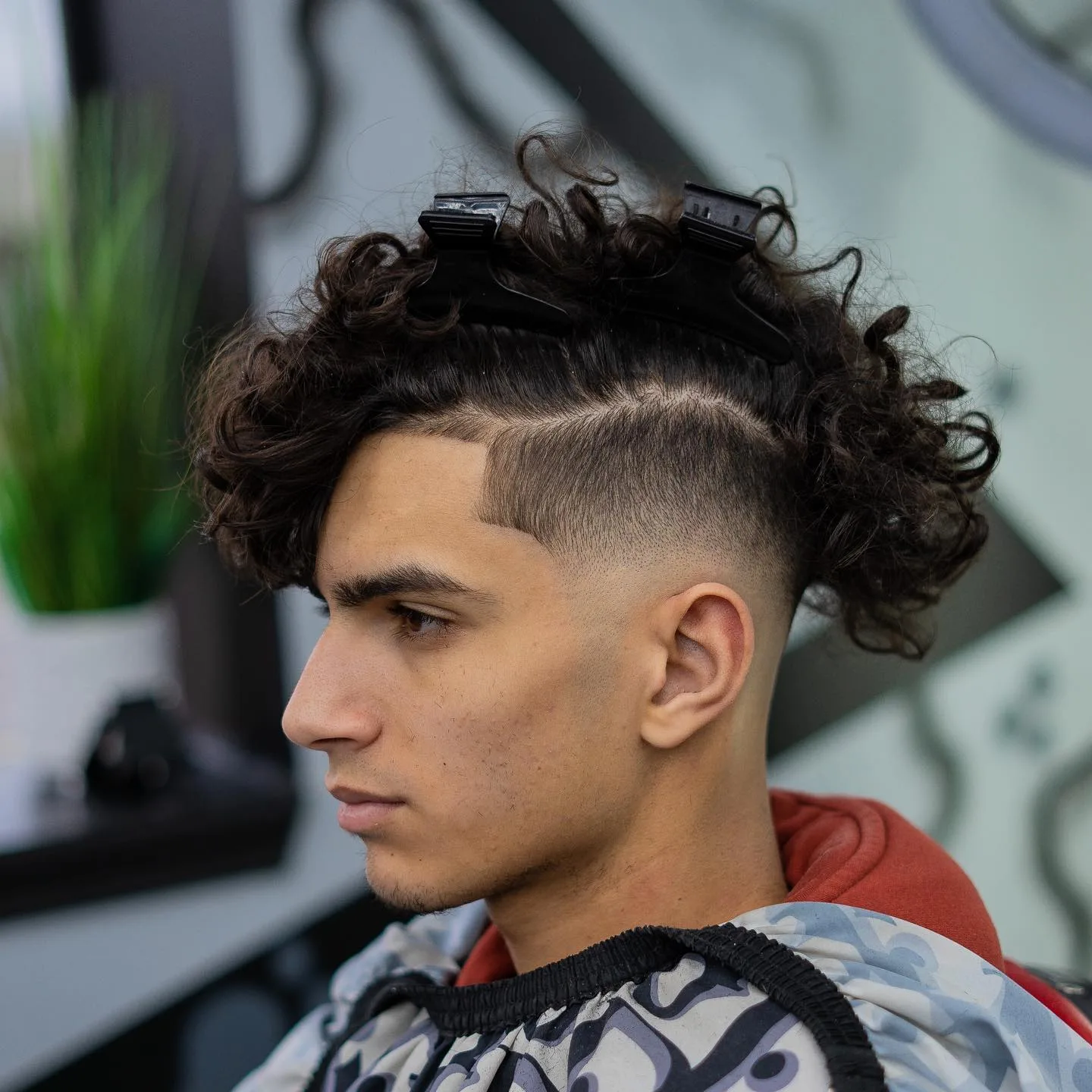 Side-Swept Curly Hair With Mid Taper