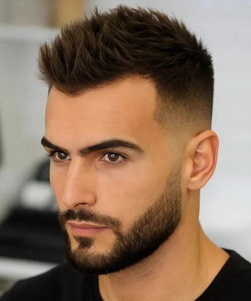 Modern Faux Hawk with choppy crown and faded sides for clean, easy-to-style structure.