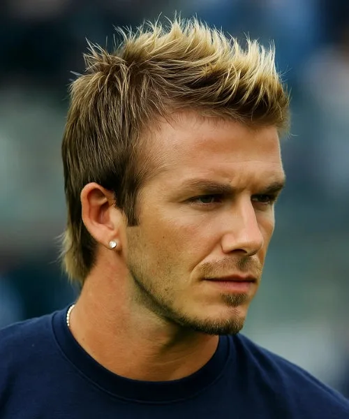 Shaggy Faux Hawk with messy layers and flipped tips for playful, low-structure flow.