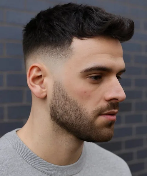 Short Faux Hawk with subtle center peak and faded sides for low-maintenance attitude.