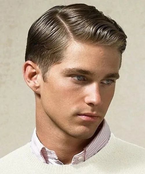 Side part haircut with smooth parted top and neatly trimmed sides for balanced style.