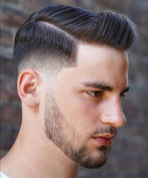 Side part quiff haircut with lifted front volume, structured sides, and neat parting.