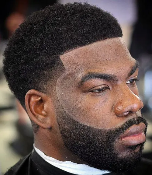 Thick Afro with Low Temp Fade and Beard