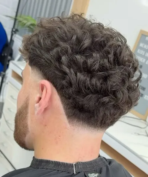 Low taper blowout for curly hair