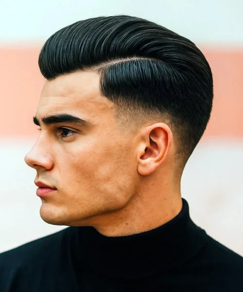 Mid taper comb over haircut with smooth transition and voluminous combed top for modern style