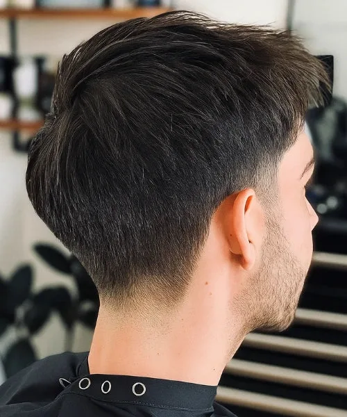 Temp fade straight hair with clean fade and smooth sleek top for a modern polished look.