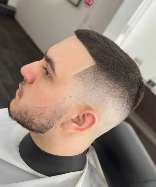 Sharp high fade haircut with clean sides and defined top for a bold men’s style