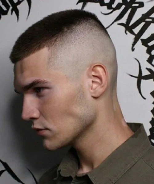 High fade military haircut with minimal top and ultra-tight sides for disciplined style