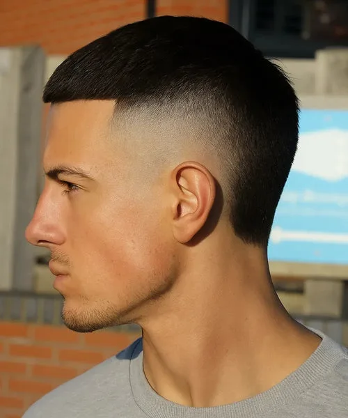 High fade mullet haircut with short top and longer back for a rebellious, textured style