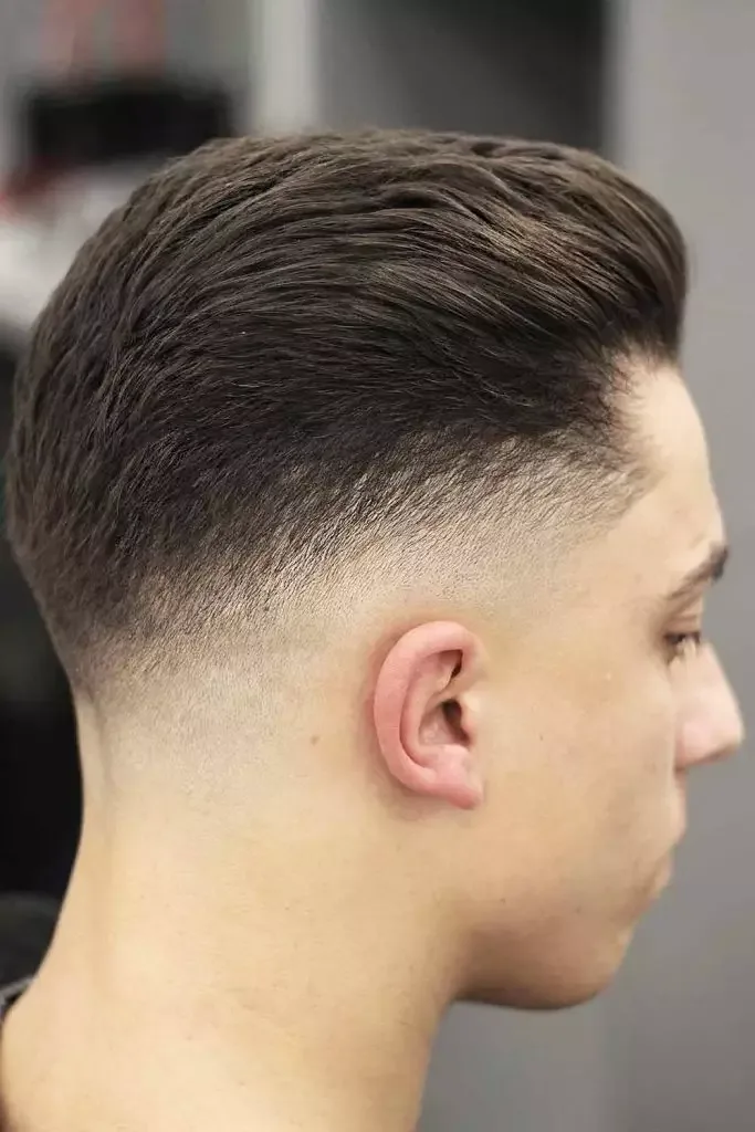 Slicked-Back Hair with Mid Drop Fade