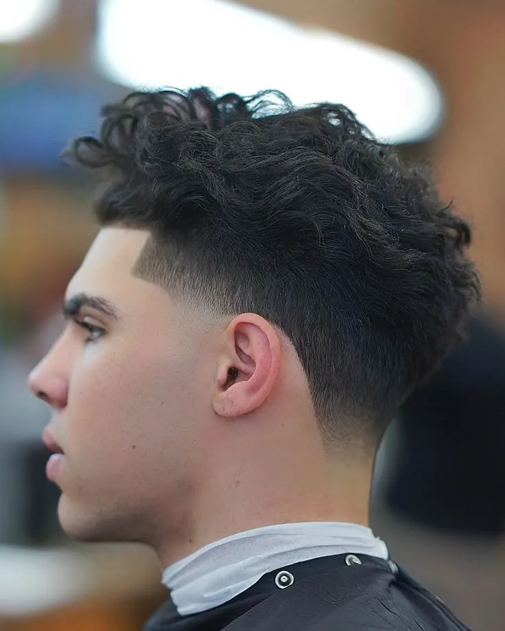 Long Wavy Hair with High Taper Fade